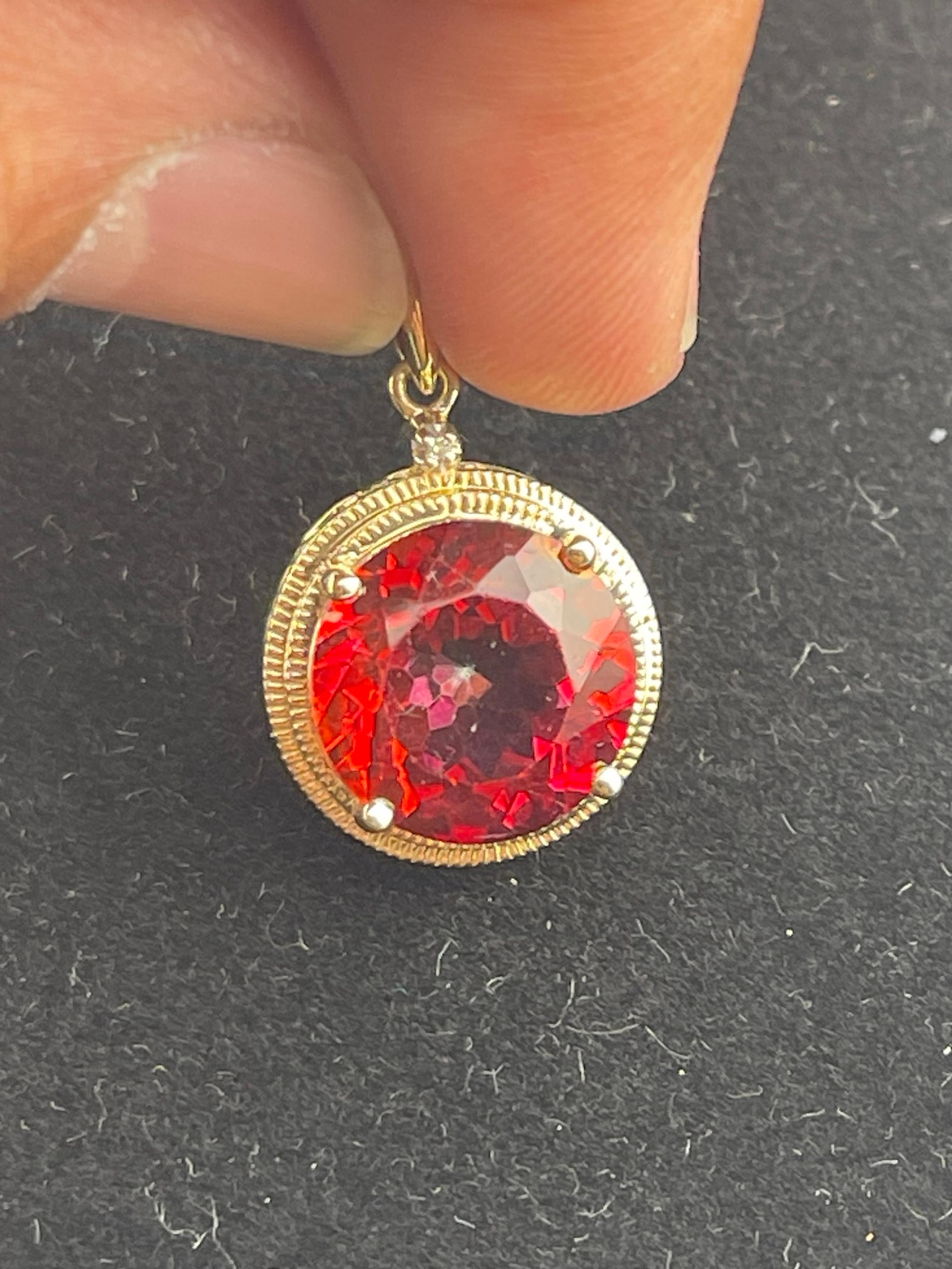Vintage simulated, 3 carat ruby and diamond pendant, 10 karat yellow gold