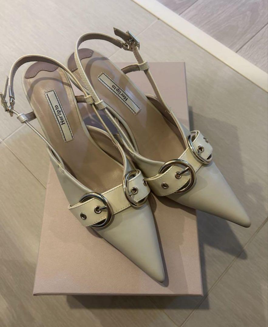 Her lip to Buckle-Belted Slingback Pumps