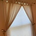Drapery set of 2 for 2 windows. Ivory color Hardware included