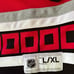 Carolina Hurricanes NHL Officially Licensed Hockey Jersey Red Size L/XL