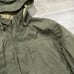 I175 NWOT REI Co-op Men's Green Pinecliff Long Sleeve Hooded Rain Coat Size XL