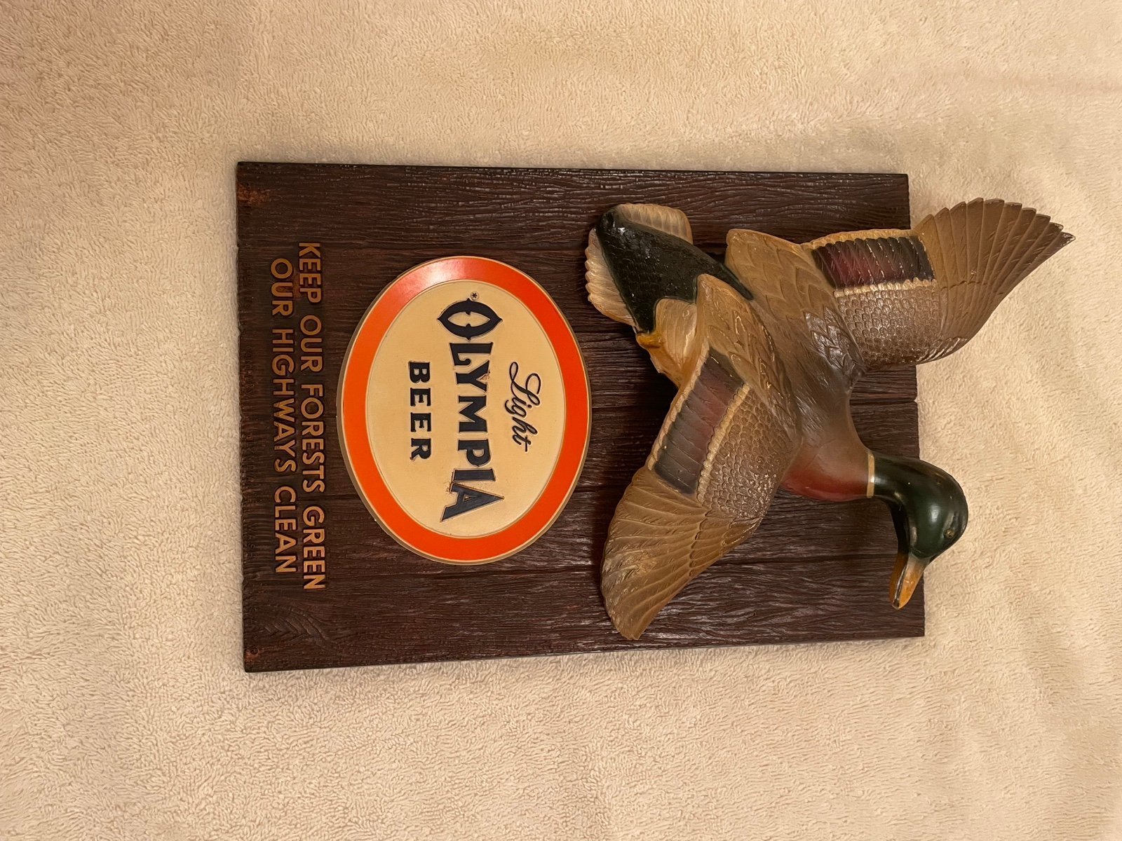 1963 Olympia wildlife duck beer sign