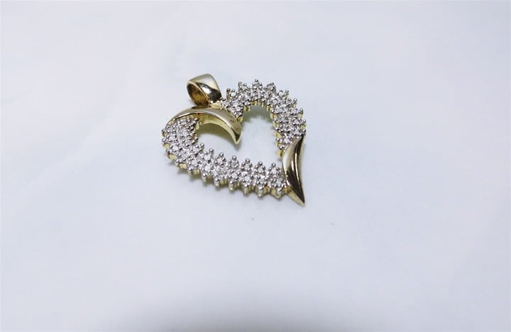 Charming Gold Over Sterling Silver Diamond Accented Cluster Style Heart Pendant