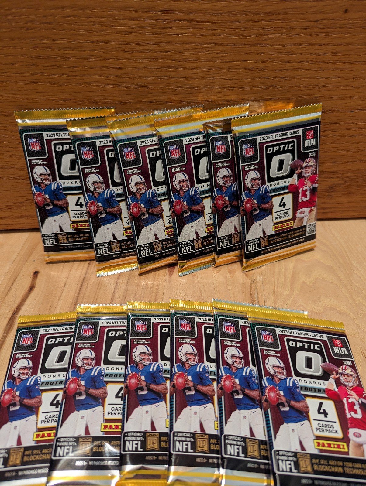 12 2023 NFL Optic Football blaster packs. New/sealed. Purple shock