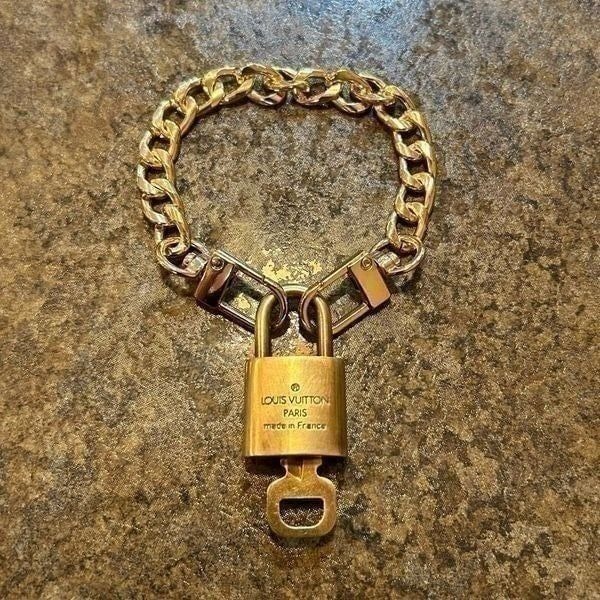 Louis Vuitton #321 Lock and Key Gold Brass with new unbranded chain