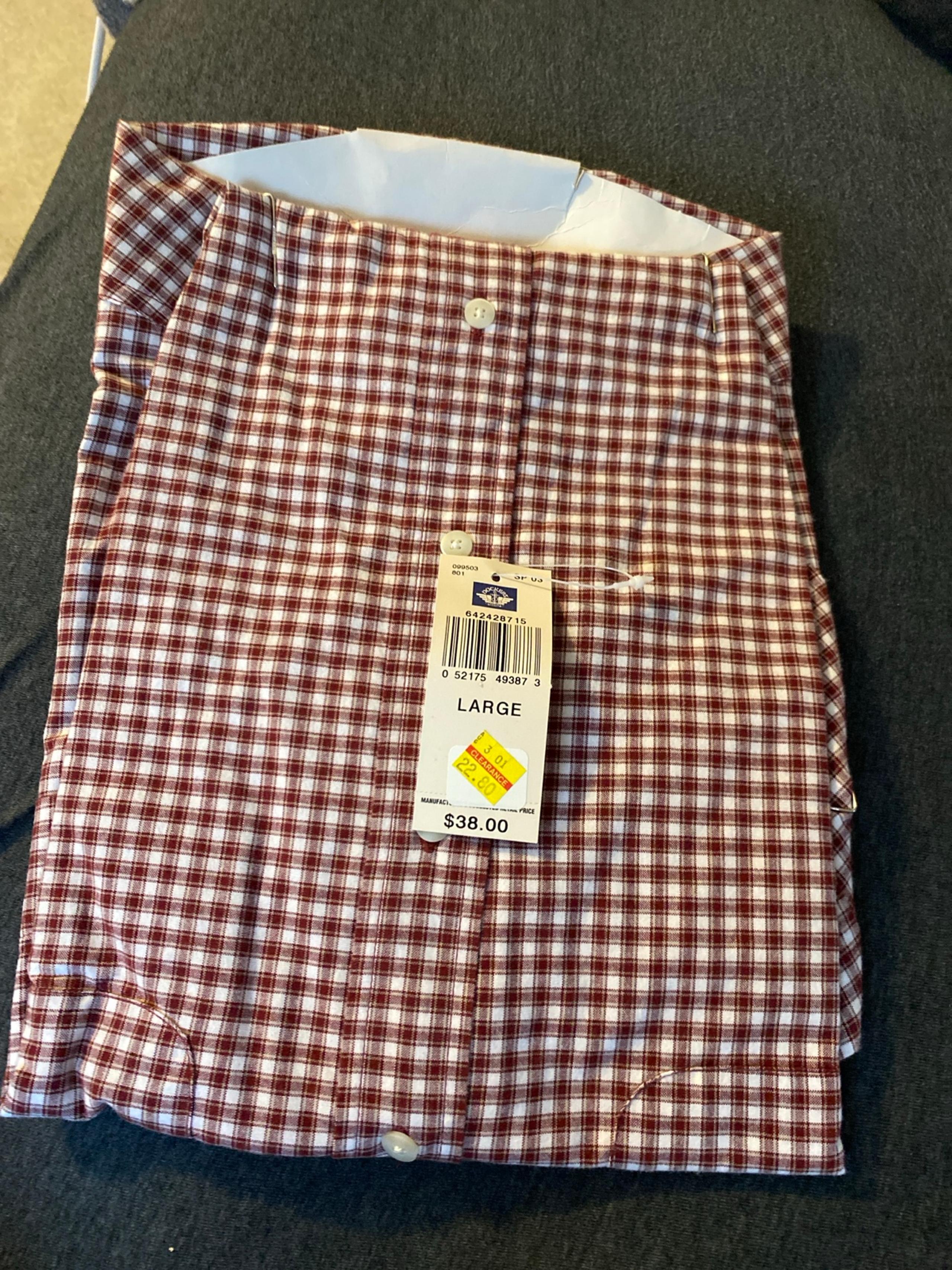 Dockers 100 percent cotton size large  short sleeves  button down collar brick
