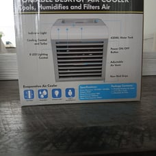 Portable desktop air cooler cools, humidifiers,and filters