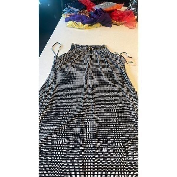 Ivanka Trump women’s dress new with tags size large. Lined, gold chain neckline.