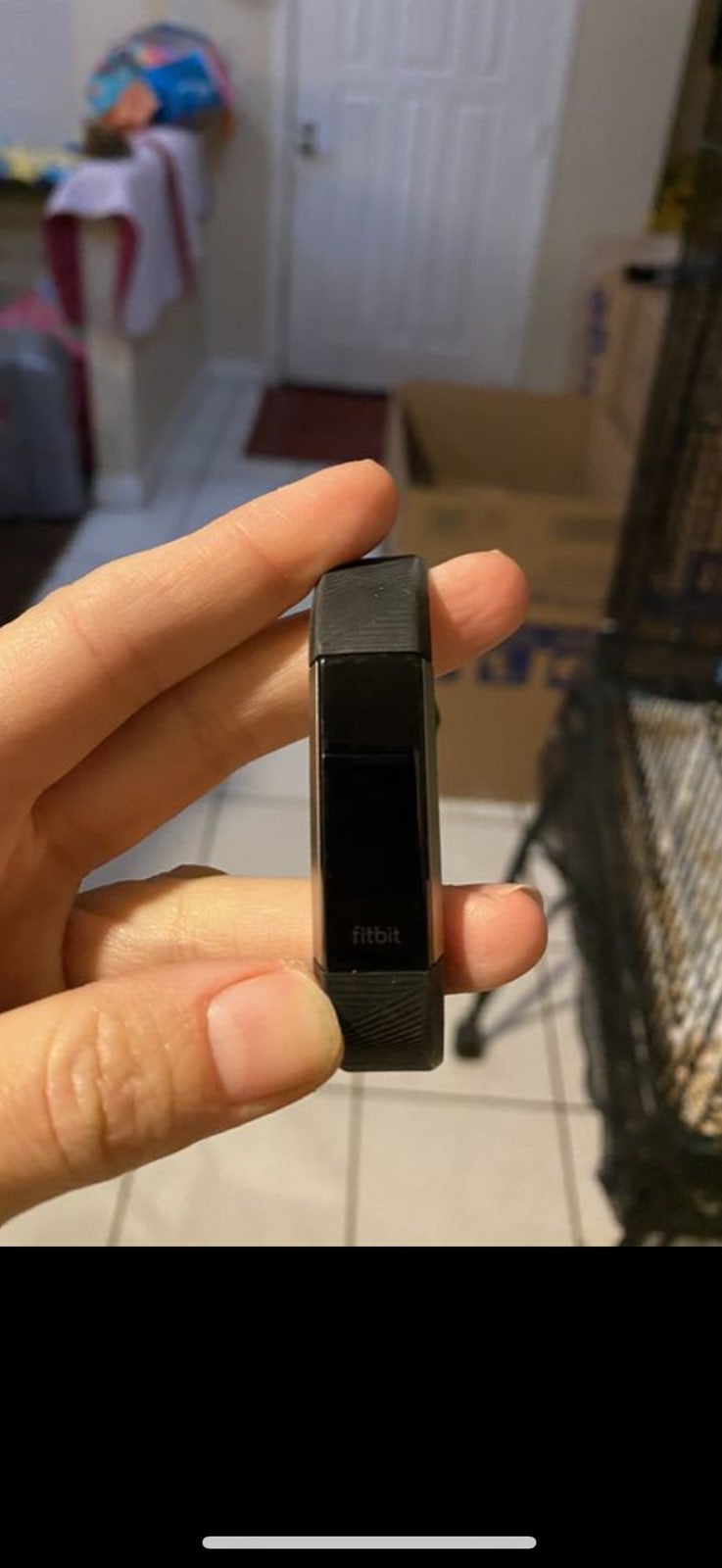 Black fitbit with charger like new