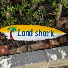 Hand carved wooden land shark surf board wall hanging-39x9 inches