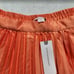 New women's S Hutch x Anthropologie pleated mini skort in Orange