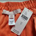 New women's S Hutch x Anthropologie pleated mini skort in Orange