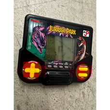 Tiger Jurassic Park LCD Handheld Electronic Game Dinosaur Gaming Collectible