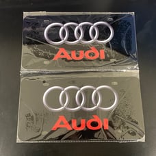 Audi Brand New Front Vanity Metal Plate Frame Holder (2 Pack)