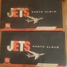 TCG jets photo album with 217/140 cards