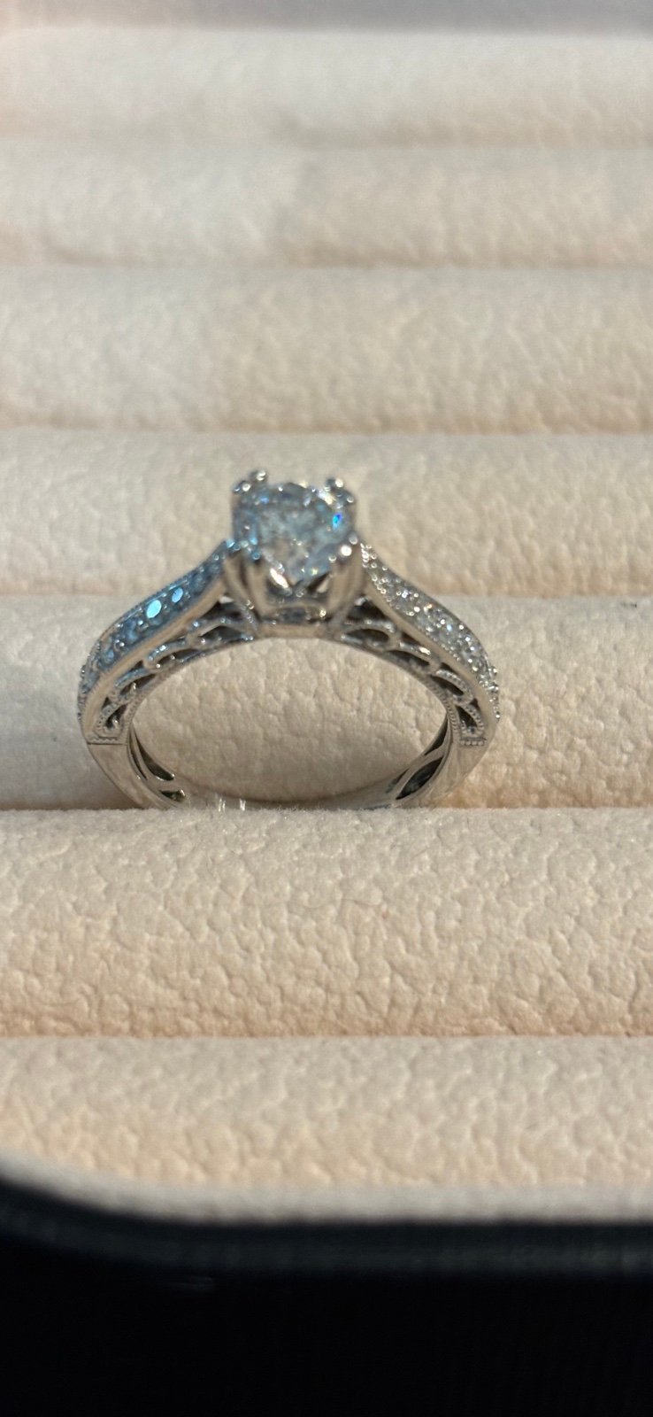 Near colorless .77 carat center stone. Real diamond rings engagement set.