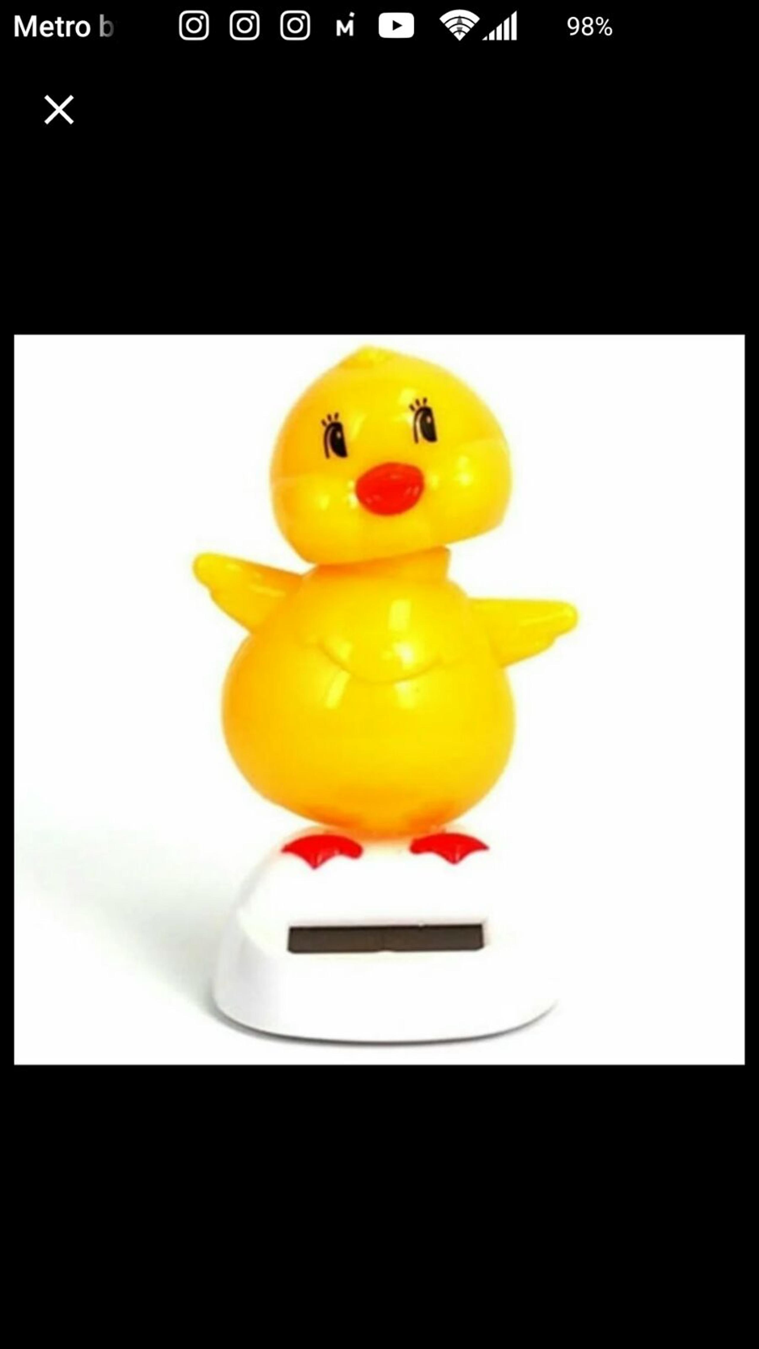 Solar powered dancing chick