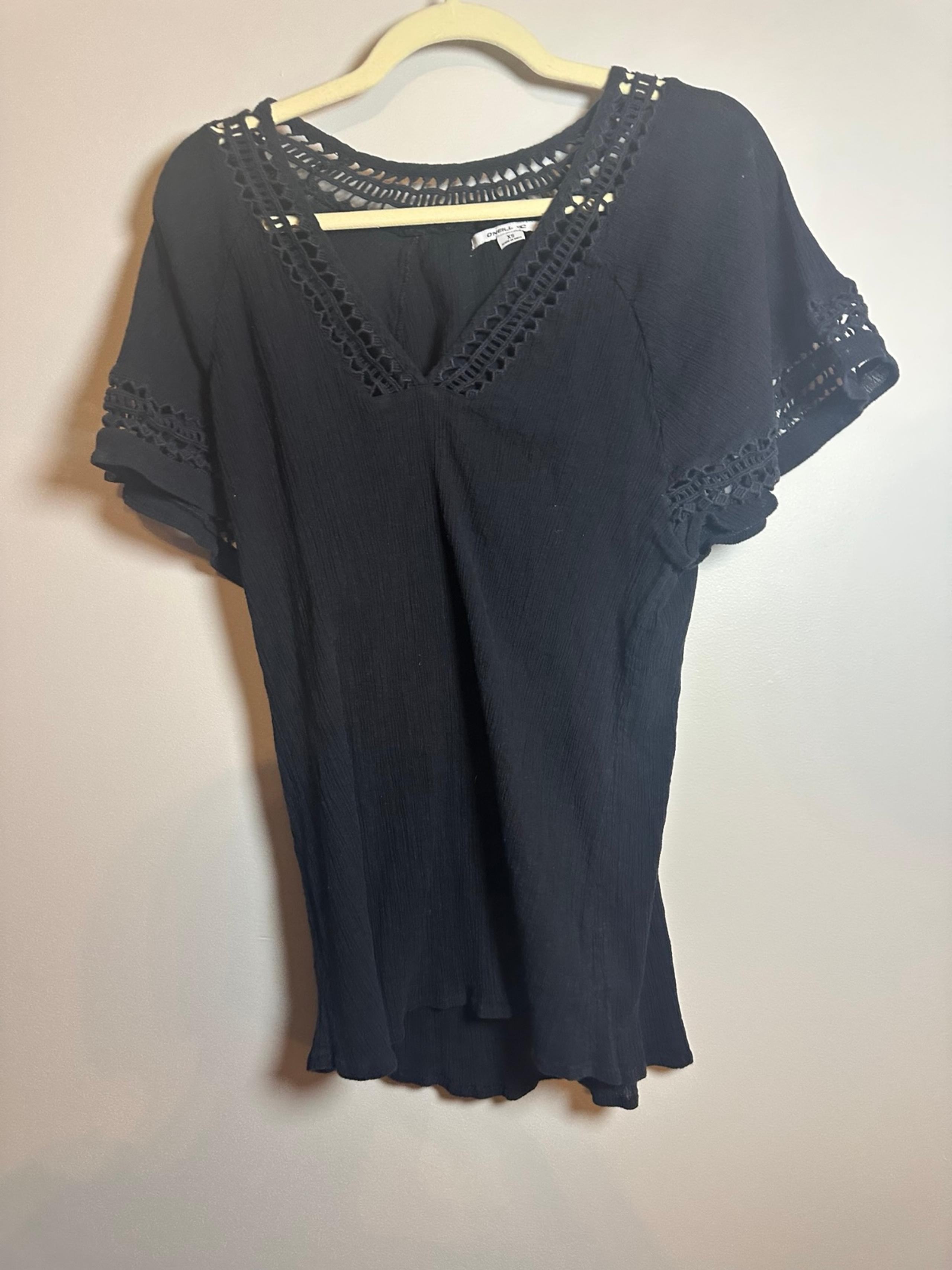 Women’s O’Neill swimsuit coverup size: XS