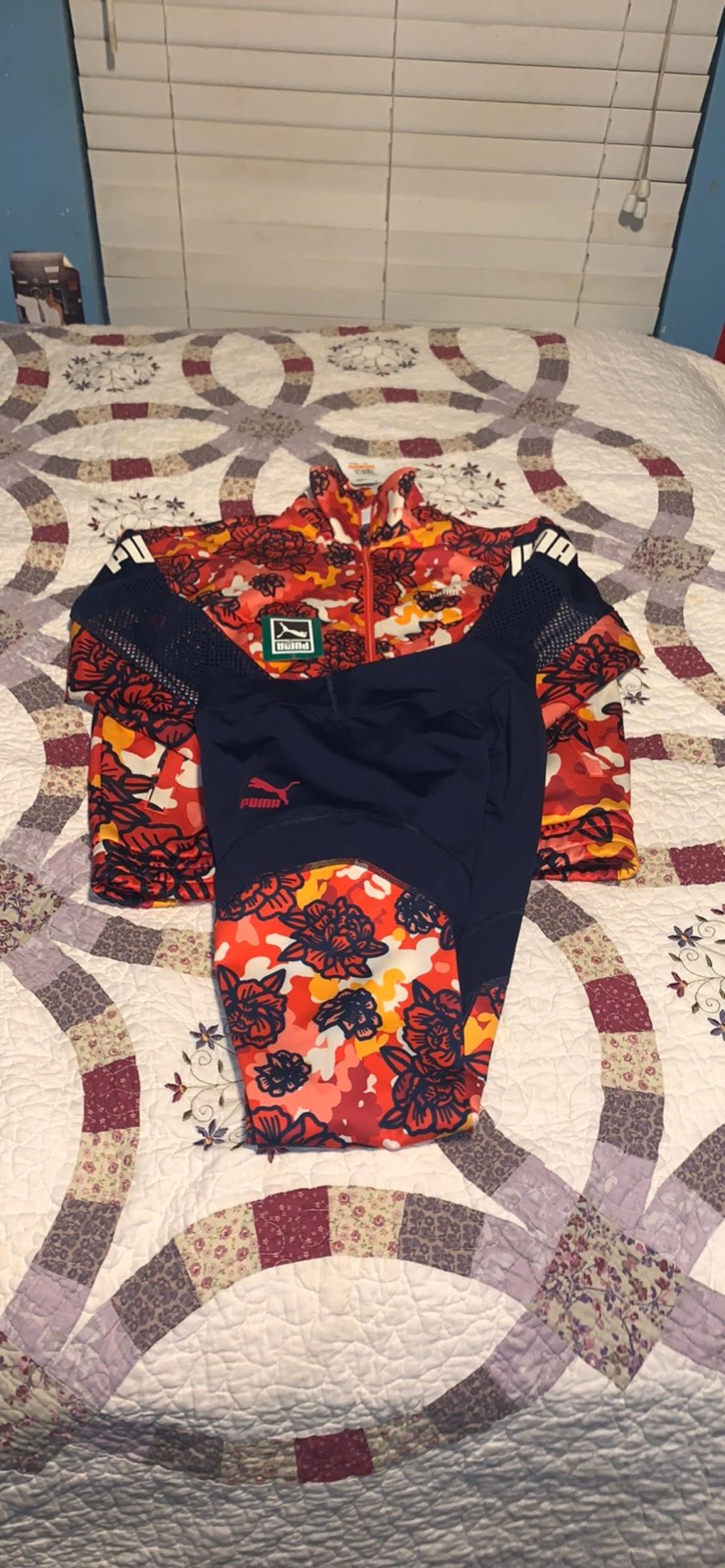 Puma flourish suit