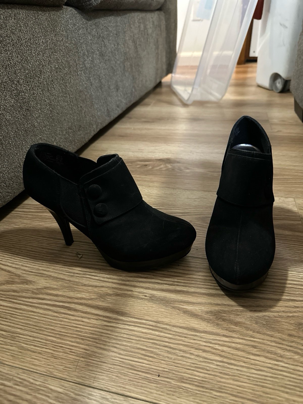 Black stiletto booties with button details