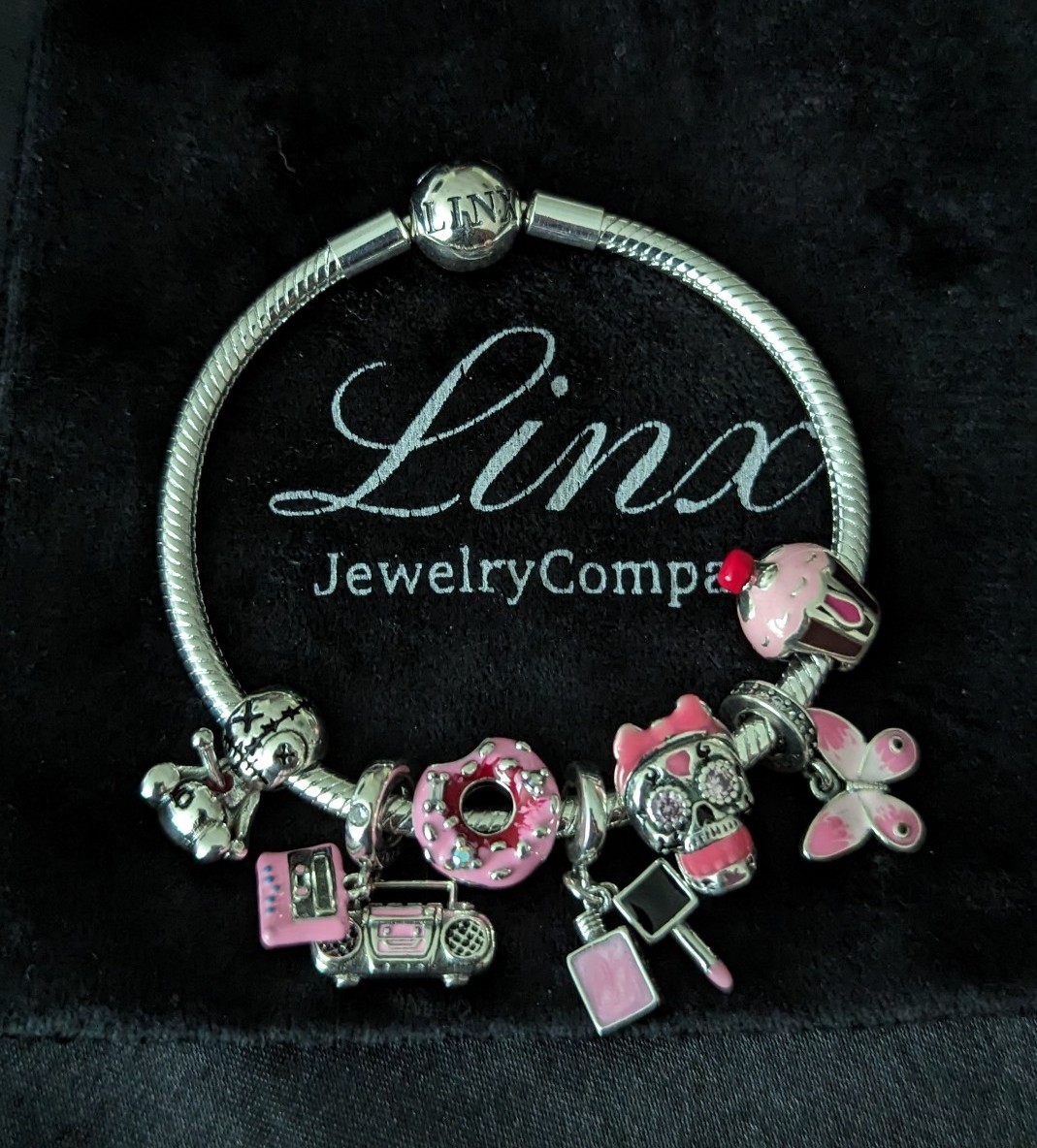 Linx Snake Chain Bracelet with Girly Skull and Sweets Charms