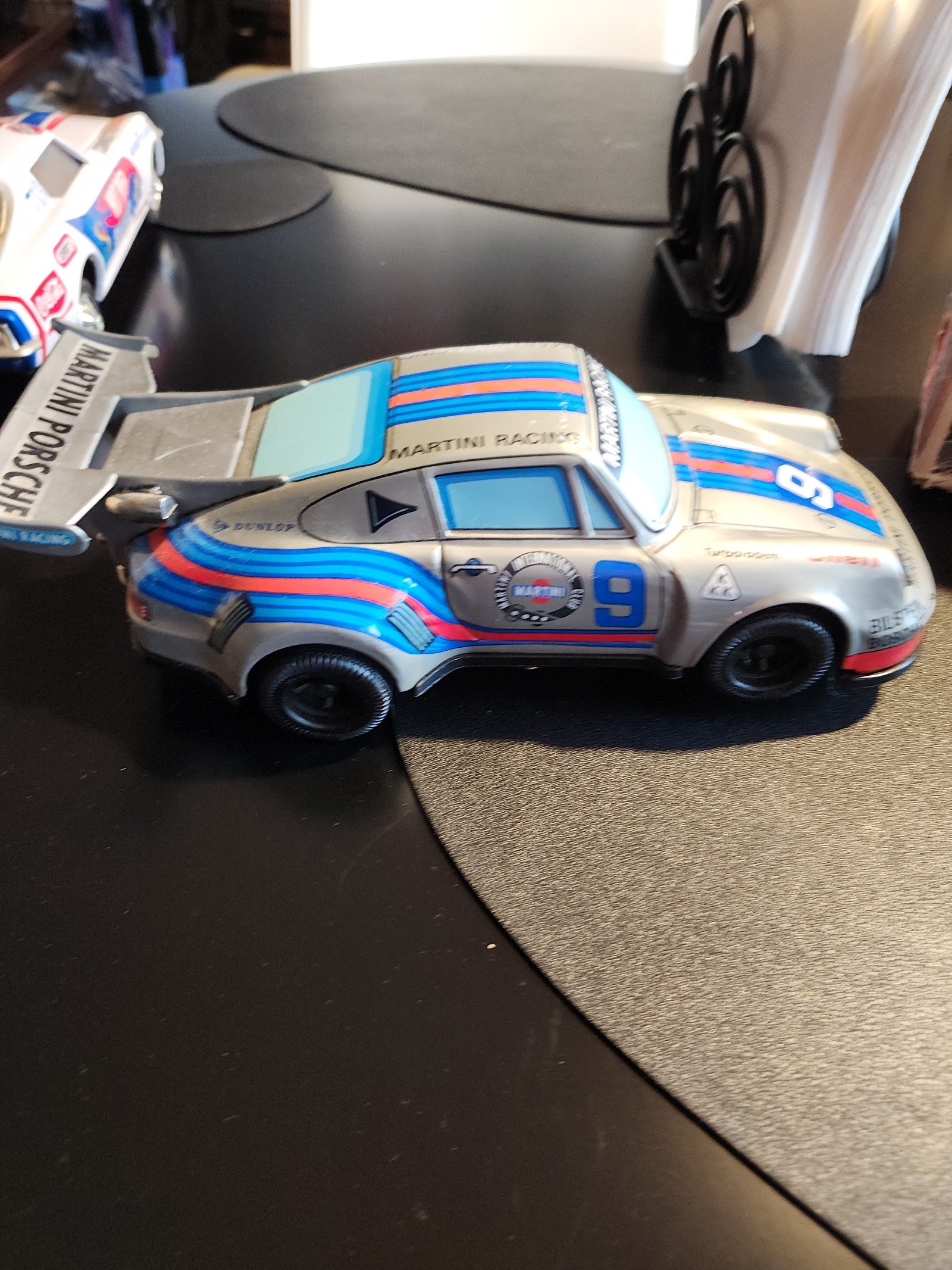 Battery operated Porsche with mystery action and it smokes really rare