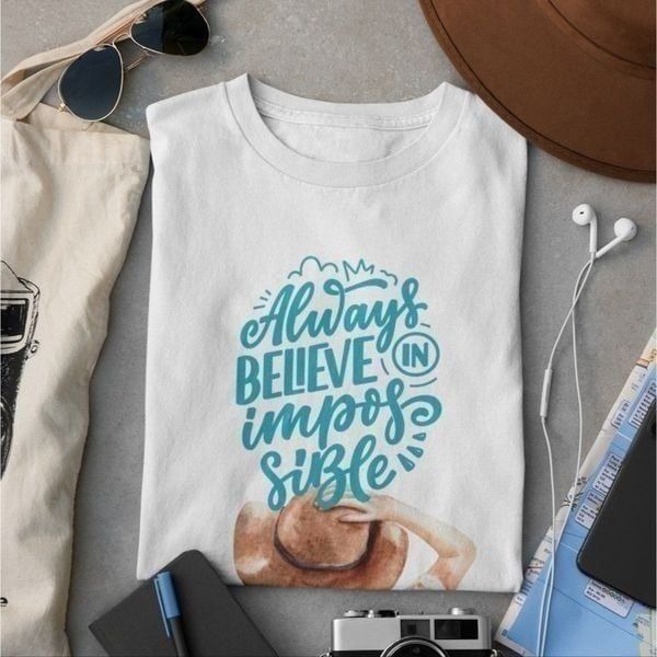 Size L Short-sleeved T-shirt printed w/ the inspirational phrase Always Believe