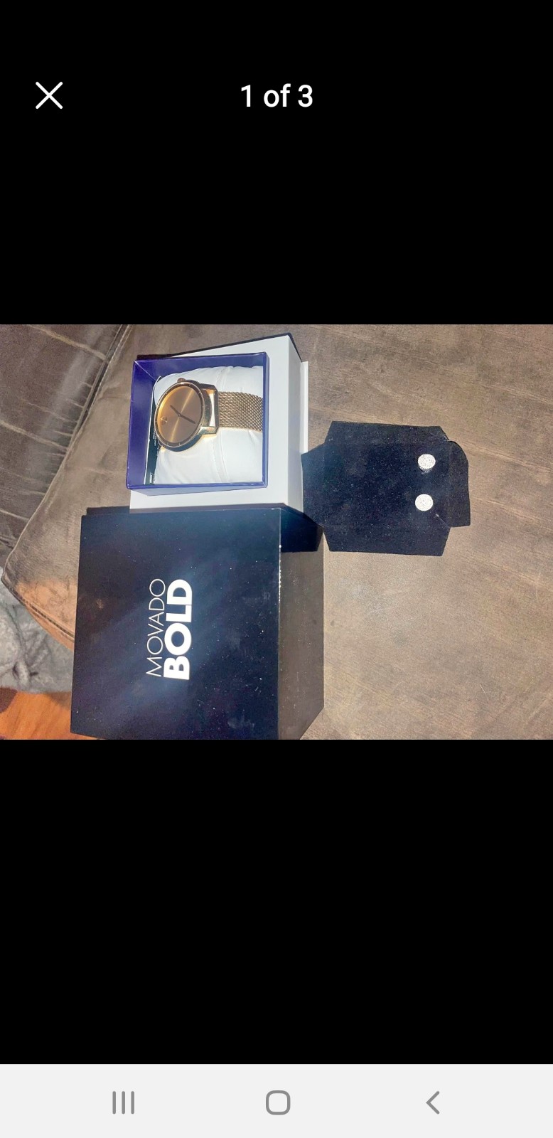 Movado bold or 1/2karat earrings