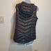 Lole size s black puffer vest filled with down small flaw
