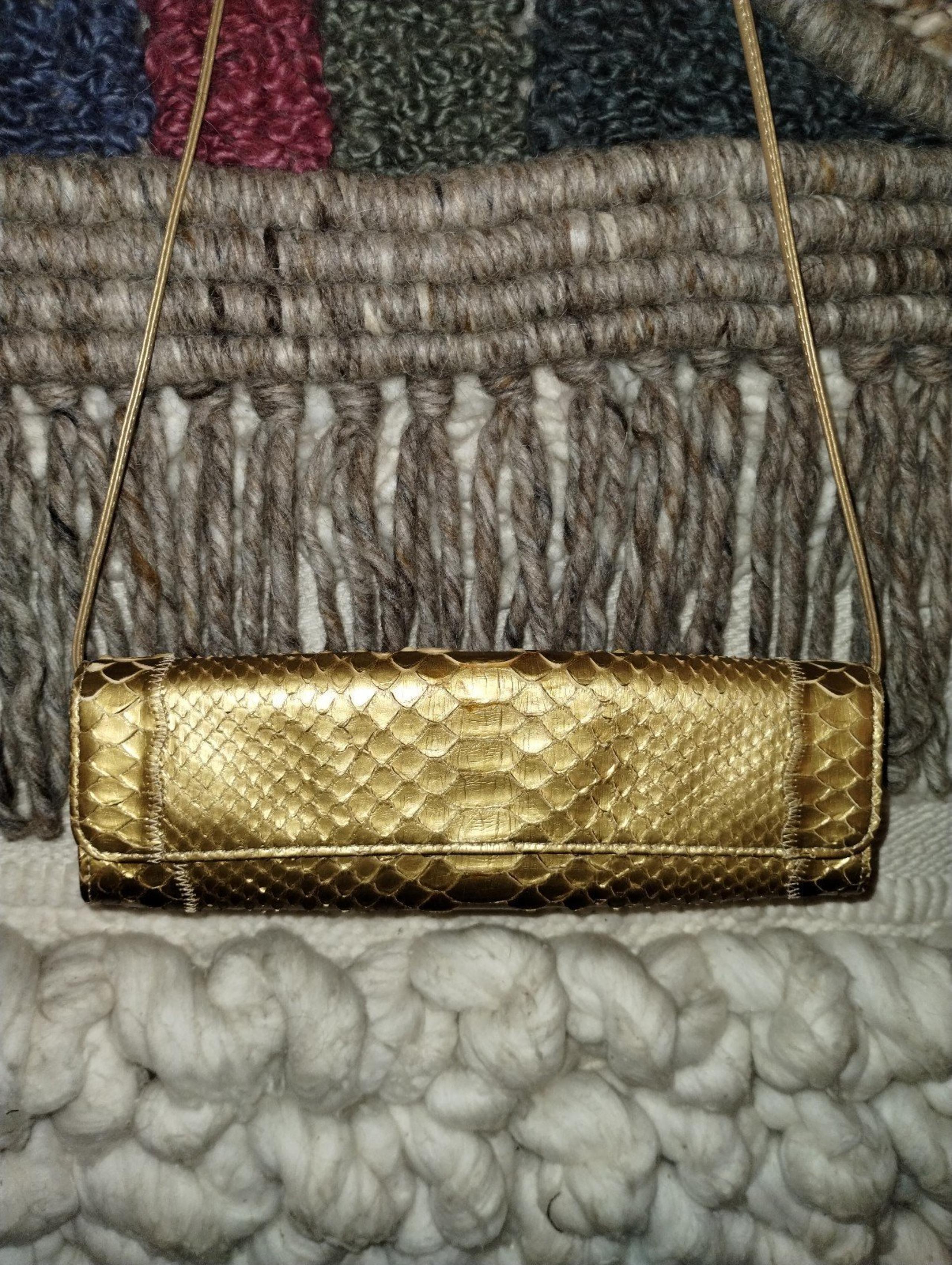 Crossbody snakeskin purse by Carlos Falchi