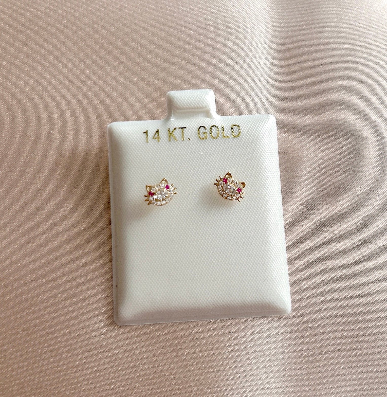 Real 14k gold kitten stud earrings.