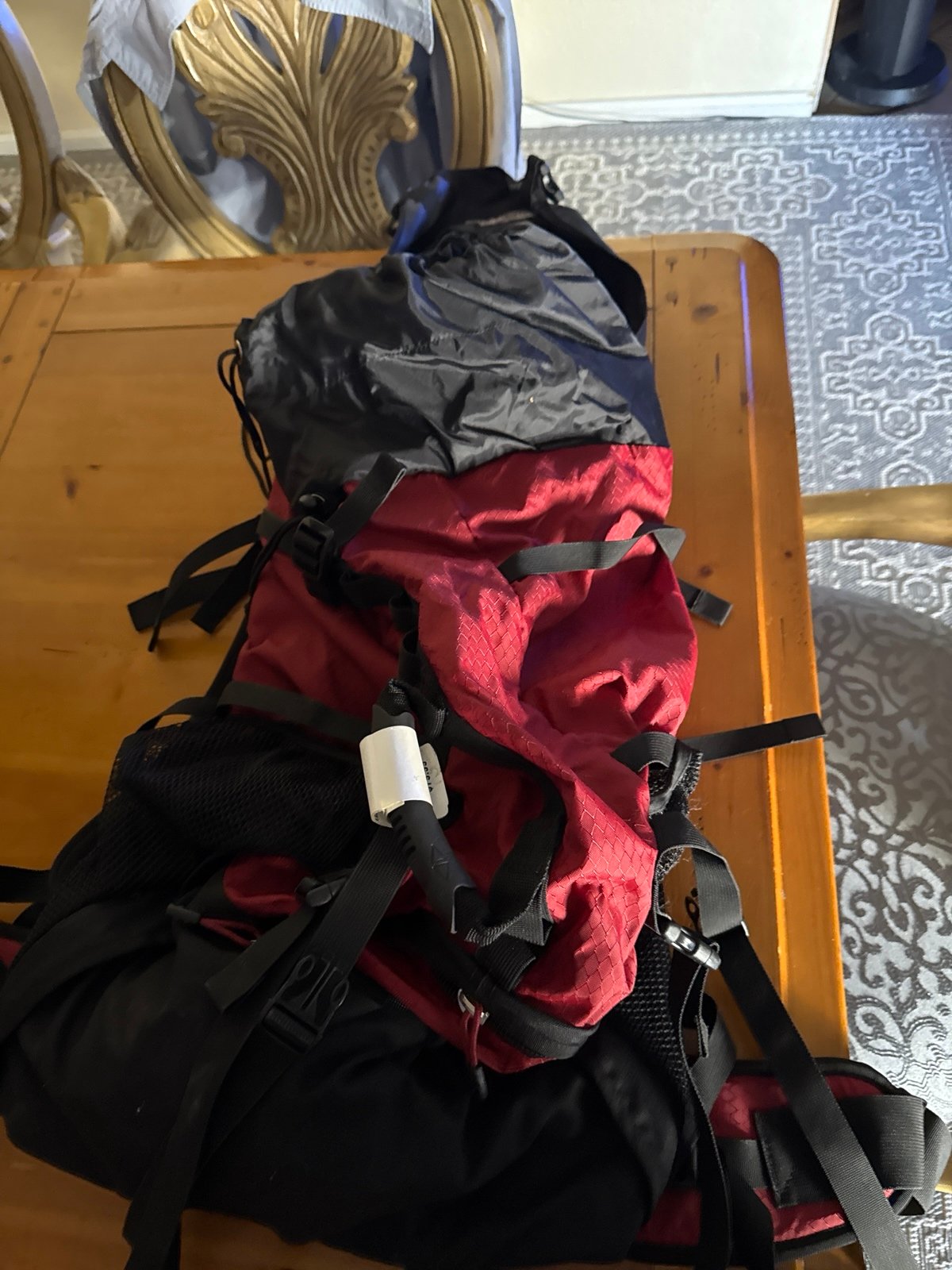 Brand new backpack never been used with tags very nice looking black with b gundy