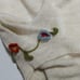 Cute explosion! Albero Bello floral embroidered tank top in cream color.