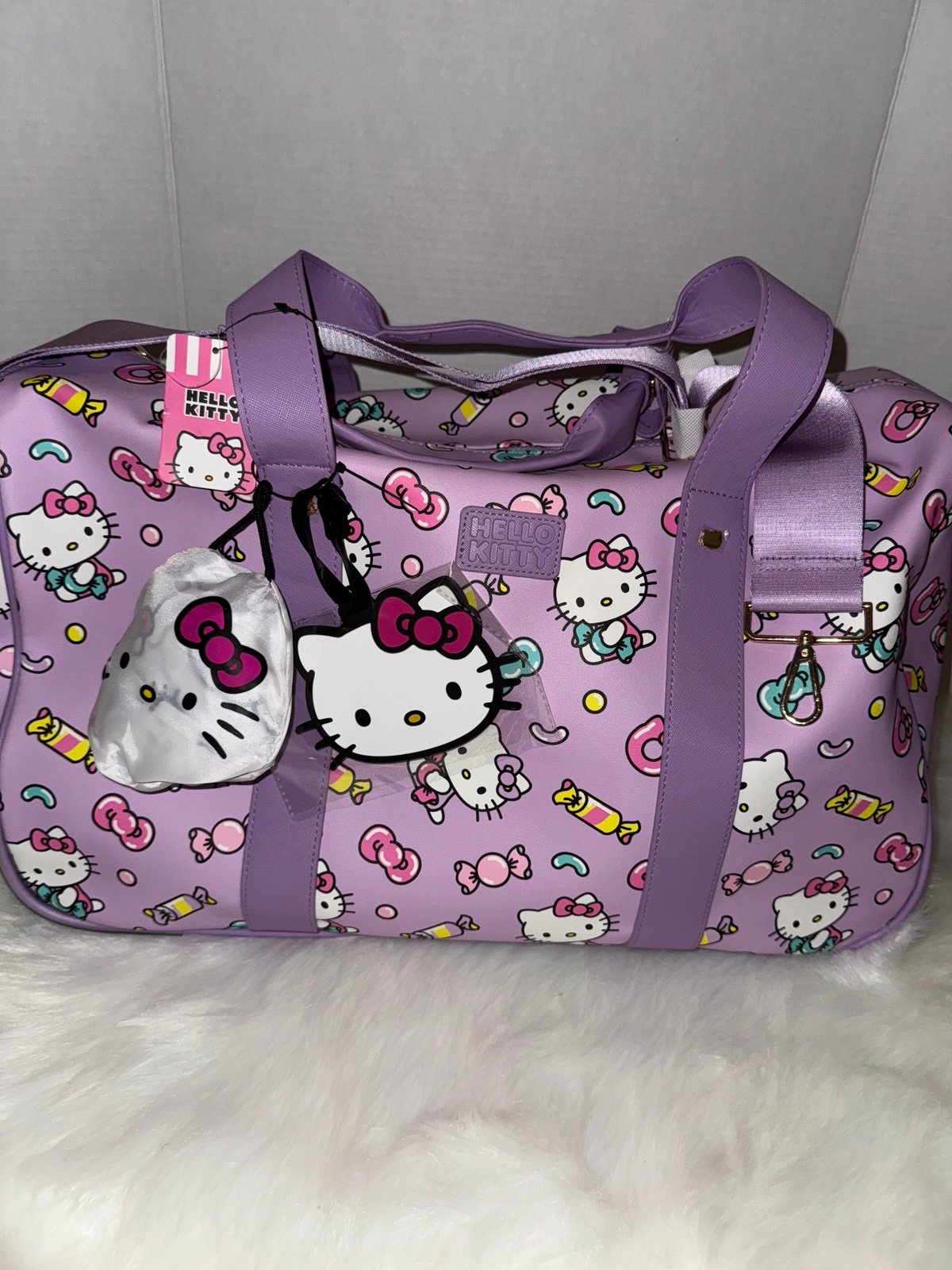 Hello kitty rolling wheeled duffle bag carry on luggage lavender spring break