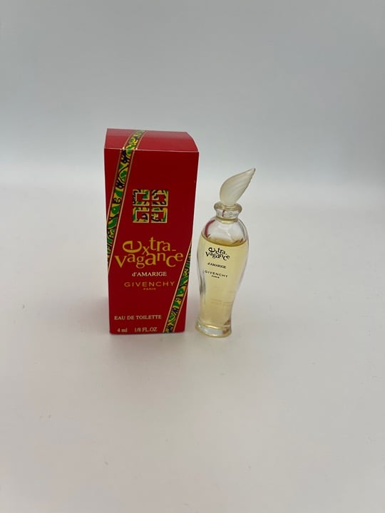 Extravagance d'Amarige Givenchy Eau de Toilet SPLASH 1/8 fl Oz / 4 miniature
