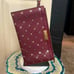 Michael Kors NWOT Burgundy and Gold Diamond Large Wristlet No Callouts