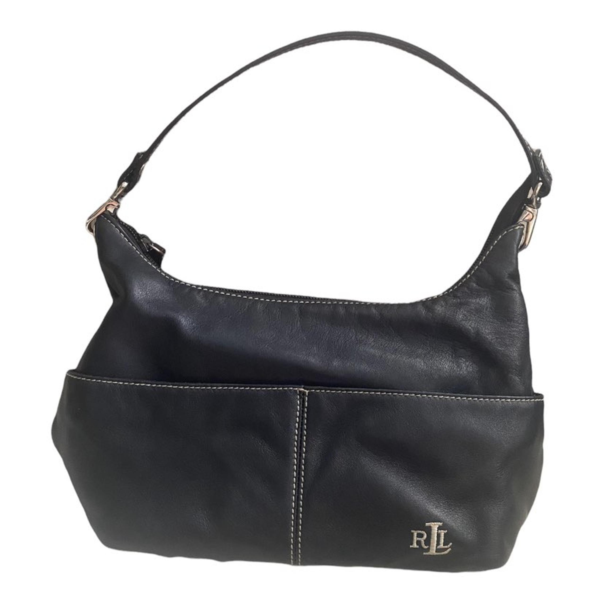 Measurements: 8"H x 12"W x 4"D Strap Drop is 9"