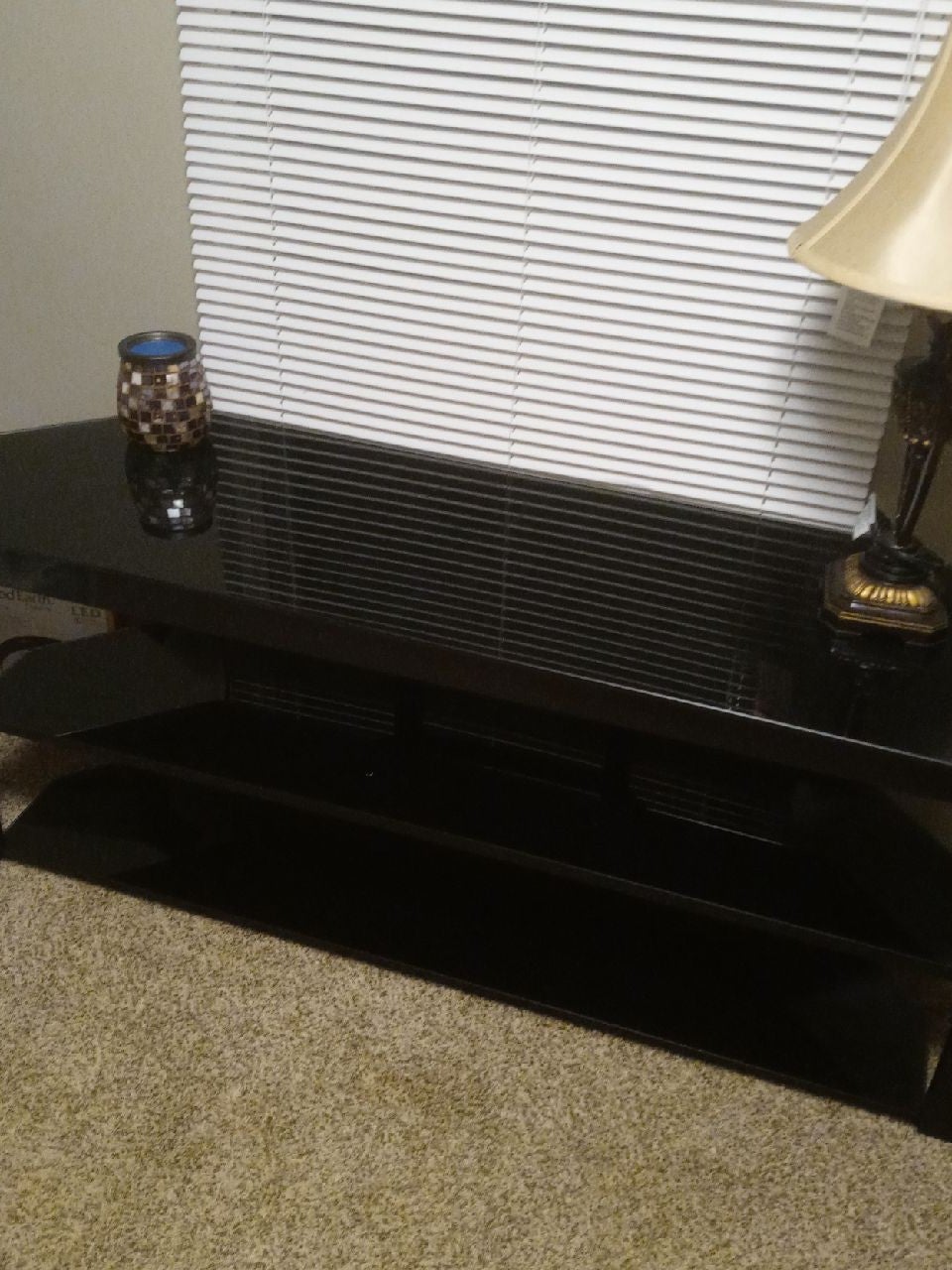 Tempered glass tv table. Holds up to a 47 tv