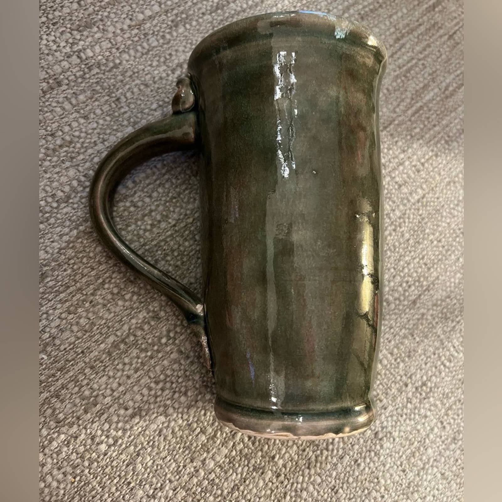 Gorgeous, vintage handmade green ceramic mug with two stars