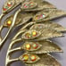 Vintage Gold Tone Leaf Brooch with Rhinestones and Intricate Branch Detailing