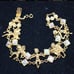 NEW Kirks Folly Cherub Movement crystal gold tone bracelet. 8 in box