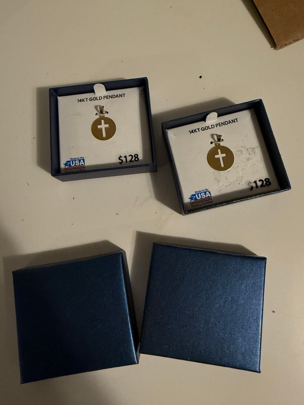Two solid Gold 14k pendants cross, new in box