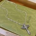 Wings cross necklace