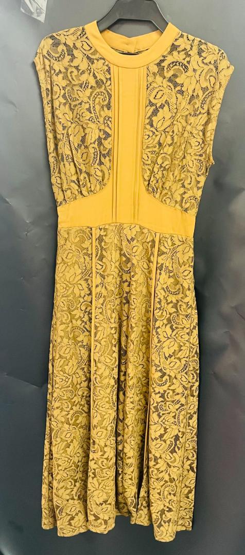 A yellow lace long skirt.