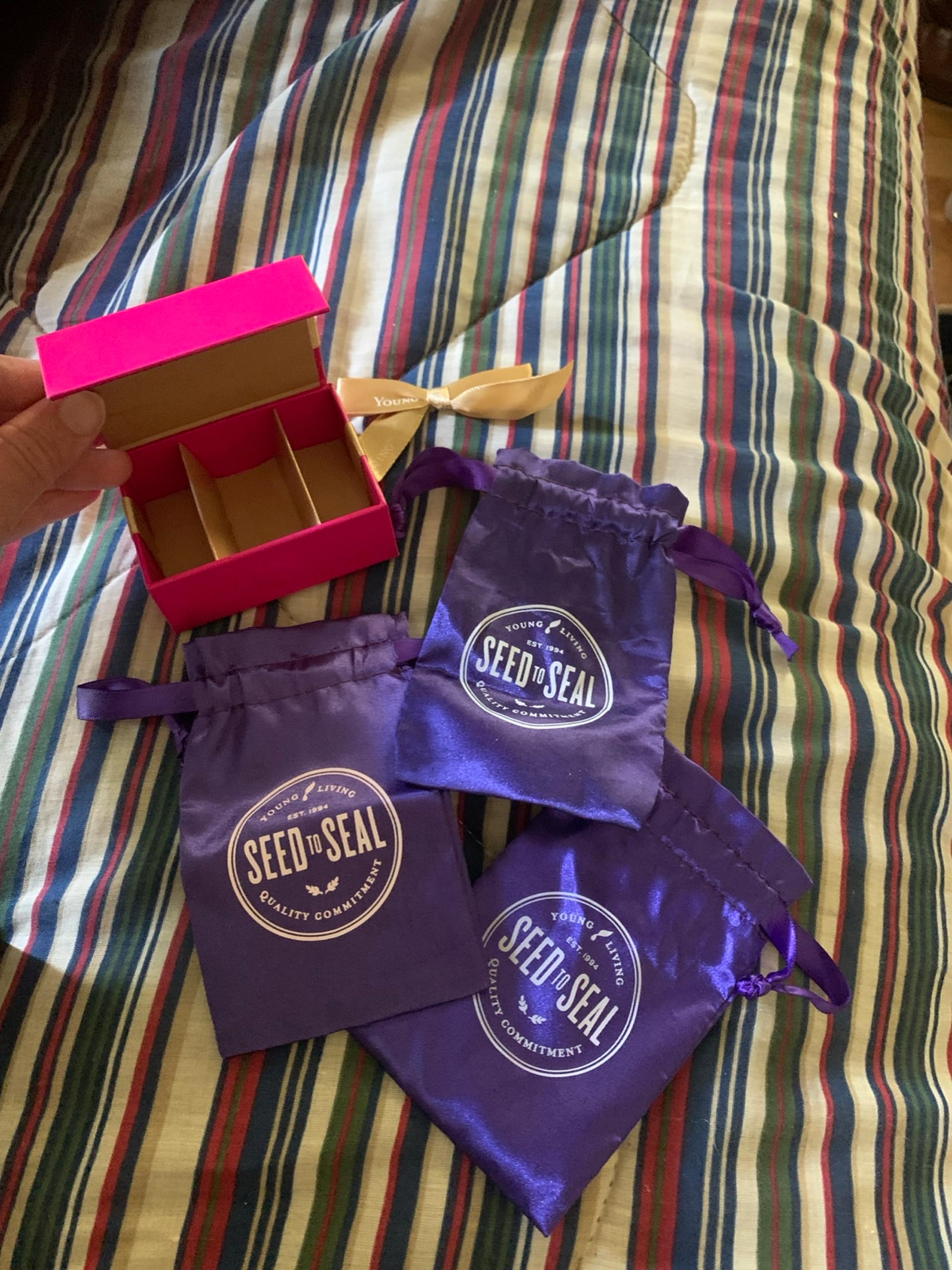 Young Living Purple Drawstring Bags with Pink Box