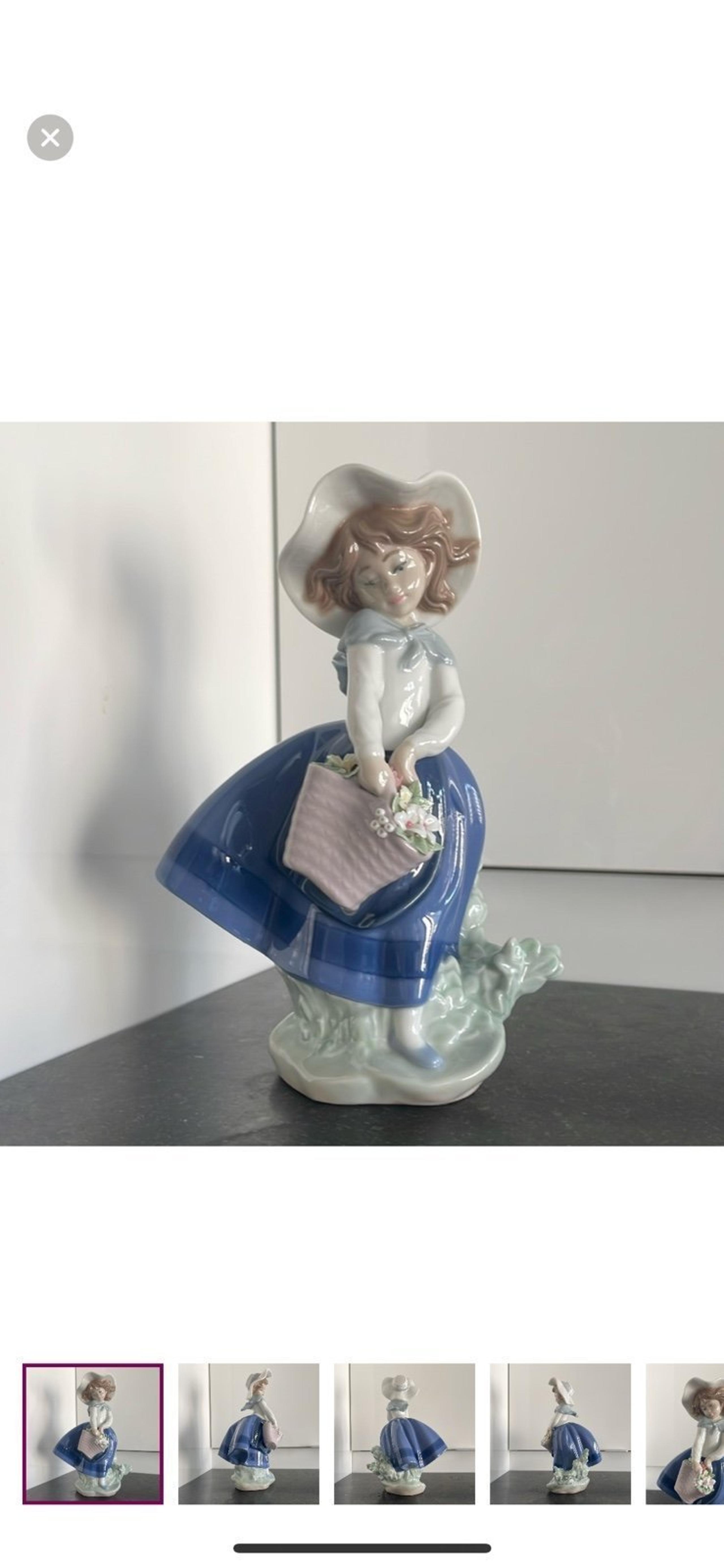 Lladro: Pretty Pickings Girl Figurine