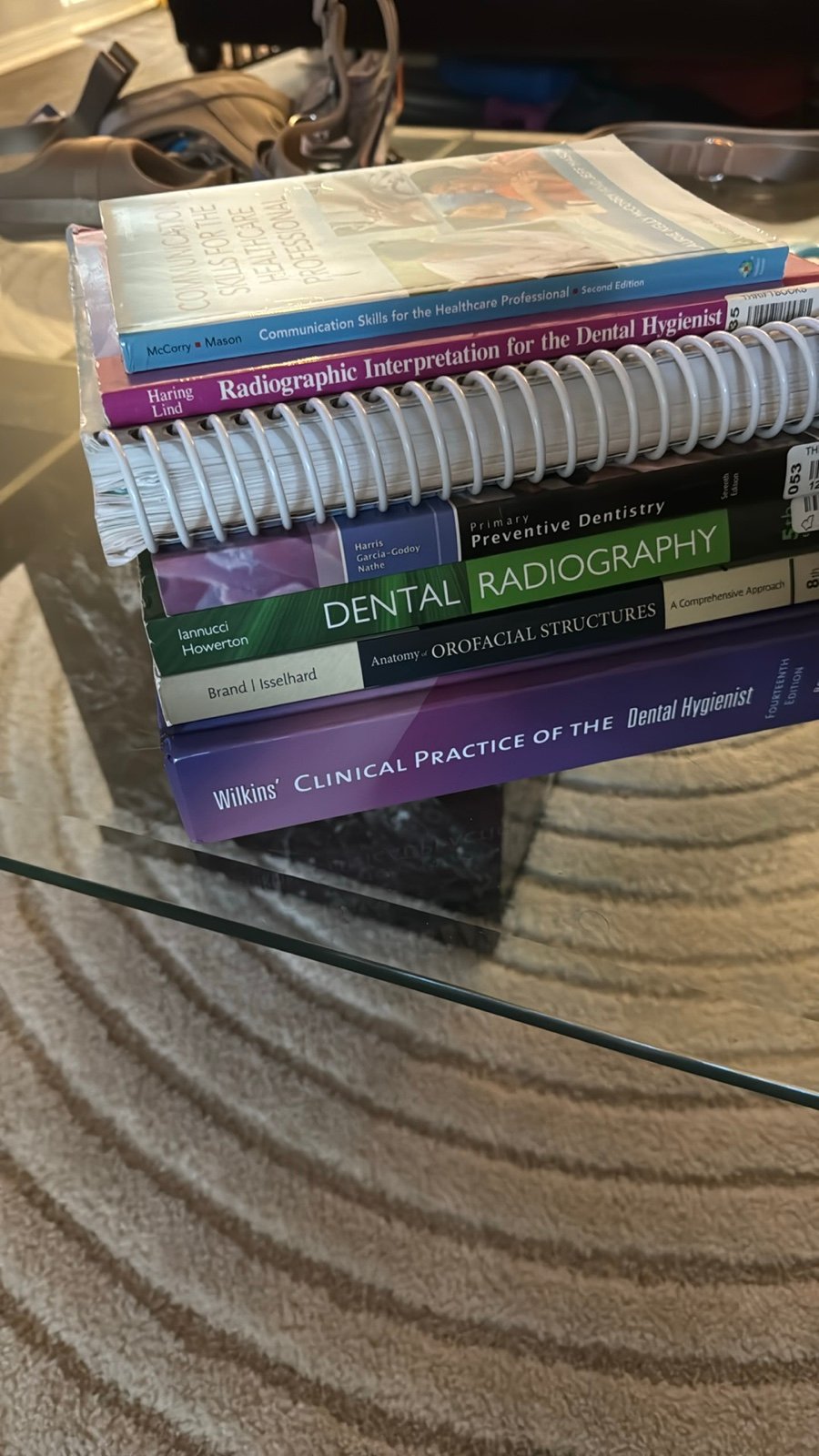 Collection of textbooks on dental hygiene and radiography