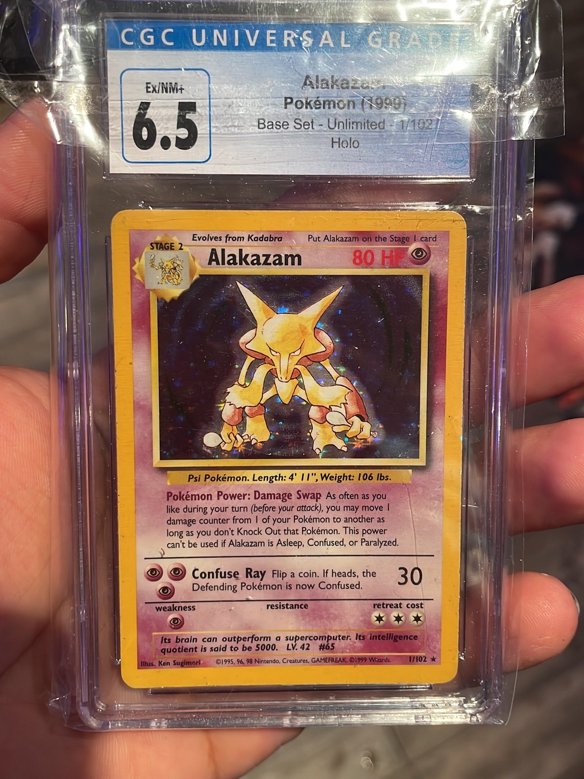 Pokemon base set alakazam cgc 6.5