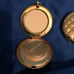 TWO VINTAGE ESTEE LAUDER TRANSLUCENT POWDER COMPACTS