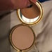TWO VINTAGE ESTEE LAUDER TRANSLUCENT POWDER COMPACTS